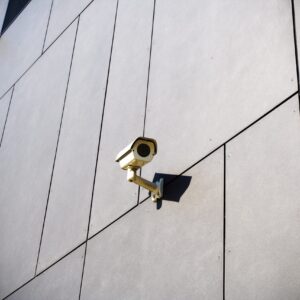 security-cameras-on-dark-building-P3MKT62-min security-cameras-on-dark
